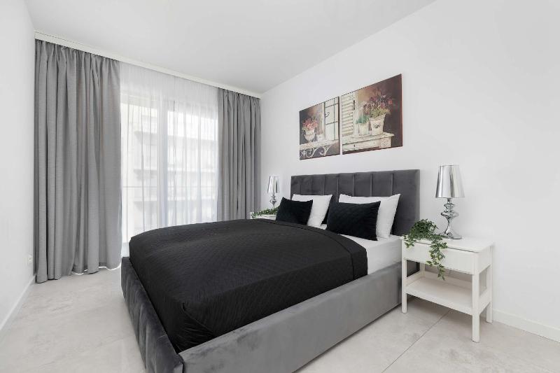 Nowoczesny Apartament z Balkonem Blisko Plaży by Noclegi Renters - image 18