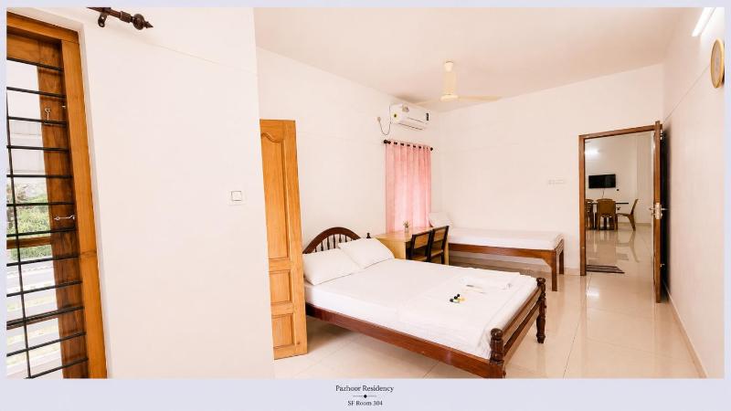 PAZHOOR RESIDENCY HOME STAY 4BHK Deluxe Apartment FF & SF - image 17