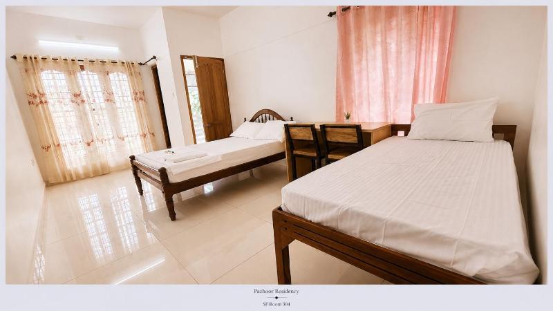 PAZHOOR RESIDENCY HOME STAY 4BHK Deluxe Apartment FF & SF - image 39