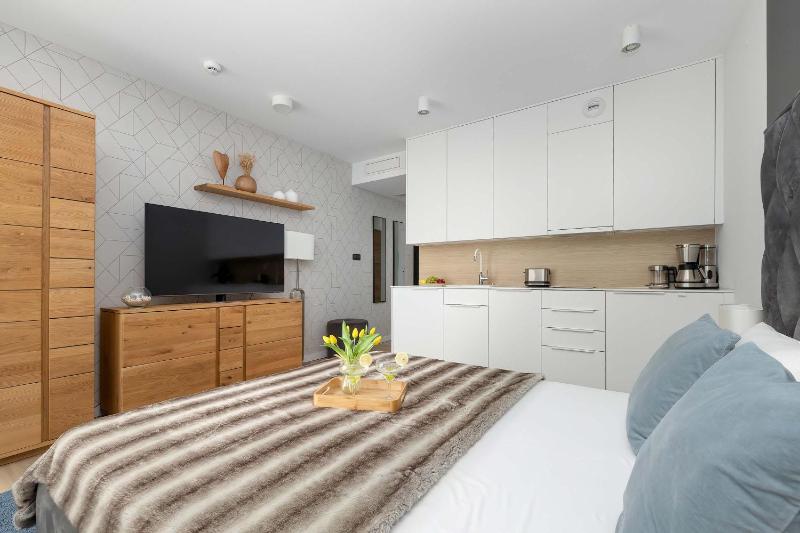 Przytulne Apartamenty Blisko Plaży z Parkingiem by Noclegi Renters - image 20