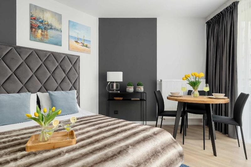 Przytulne Apartamenty Blisko Plaży z Parkingiem by Noclegi Renters - image 17