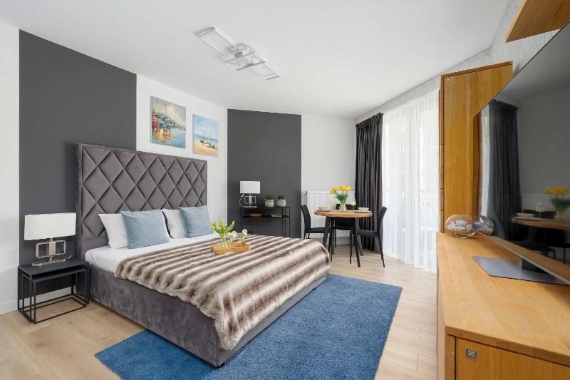 Przytulne Apartamenty Blisko Plaży z Parkingiem by Noclegi Renters - image 33