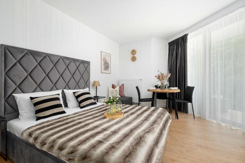 Przytulne Apartamenty Blisko Plaży z Parkingiem by Noclegi Renters - image 36