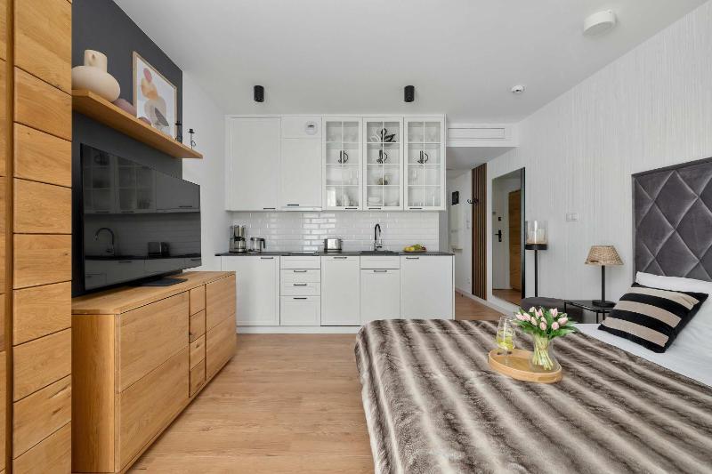 Przytulne Apartamenty Blisko Plaży z Parkingiem by Noclegi Renters - image 19