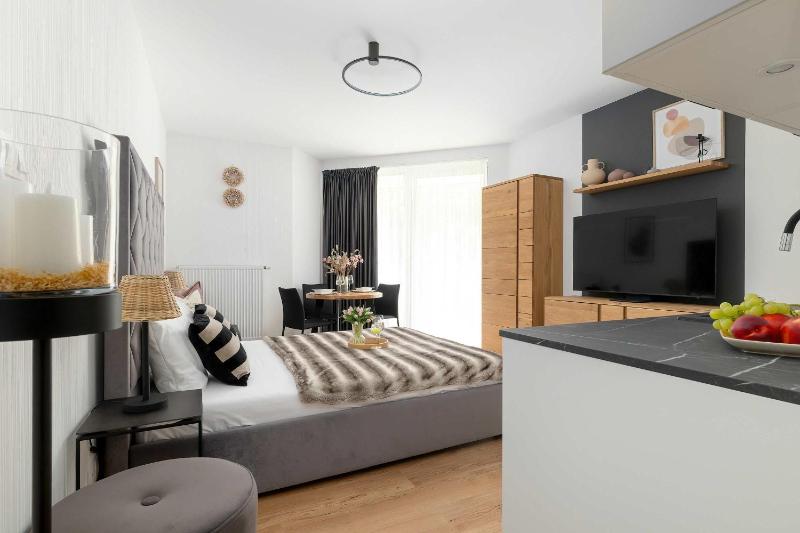 Przytulne Apartamenty Blisko Plaży z Parkingiem by Noclegi Renters - image 23