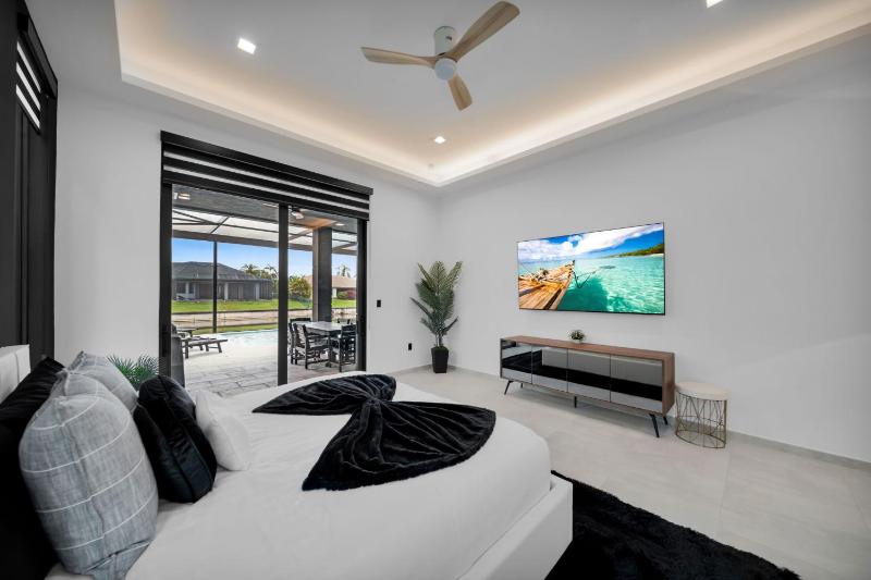 Modern Luxe Home - pool jacuzzi and channel view - image 37