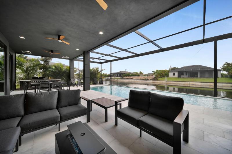 Modern Luxe Home - pool jacuzzi and channel view - image 35
