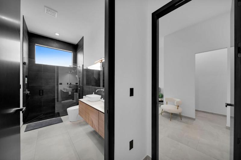 Modern Luxe Home - pool jacuzzi and channel view - image 42