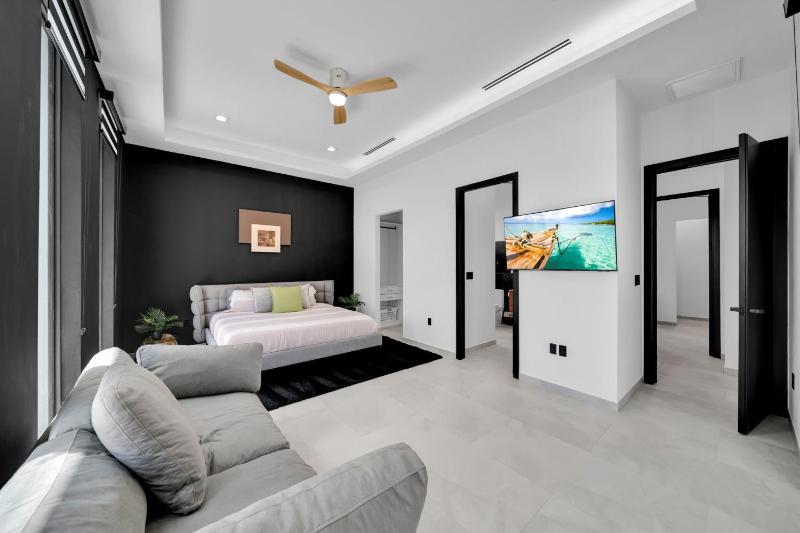 Modern Luxe Home - pool jacuzzi and channel view - image 30