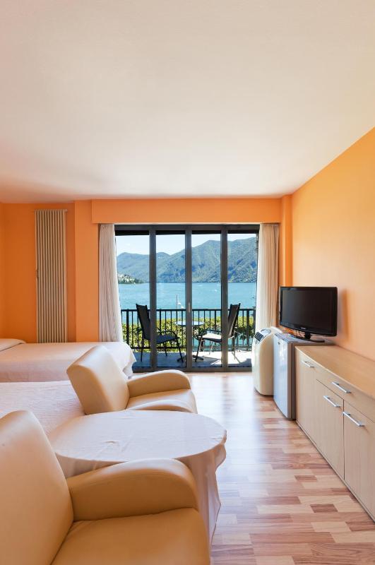 Standard Triple Room with Lake View and Balcony image 4