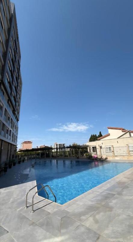 PMTR BAR Luxury Sea View 2BR Apartment Modern Pool Parking - image 13