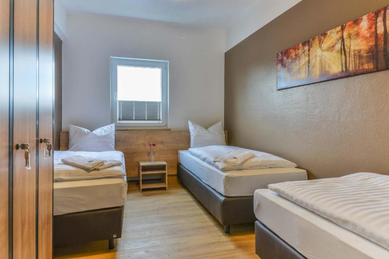 Triple Room- shared bathroom/toilet image 1