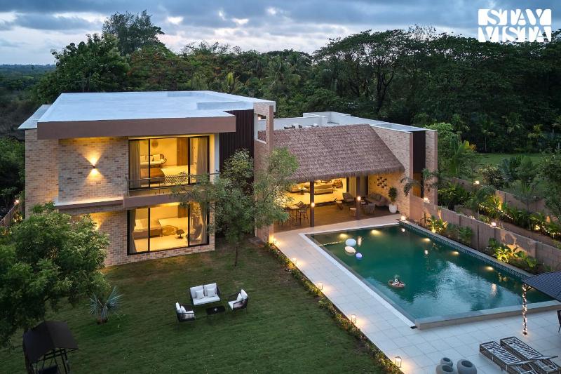 StayVista at La Rivieraa with Pool Lawn - image 1