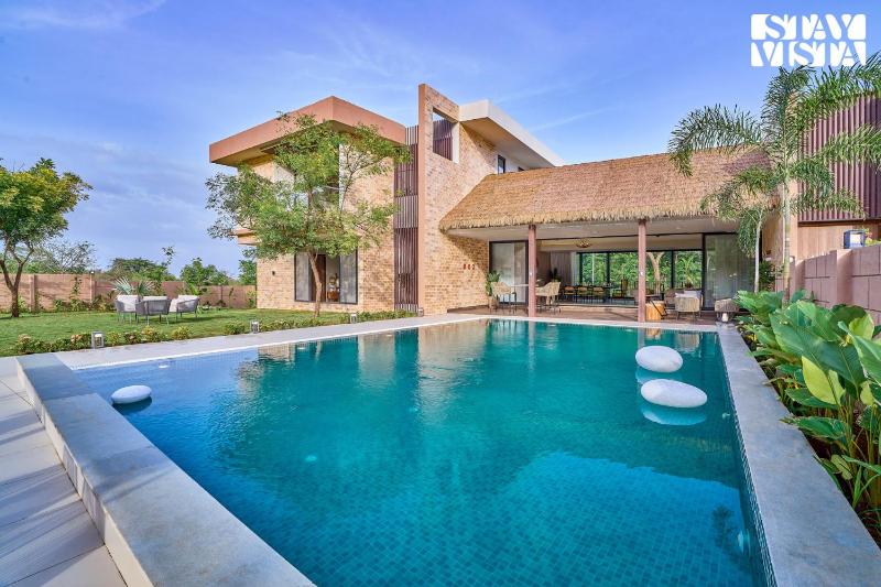 StayVista at La Rivieraa with Pool Lawn - image 19