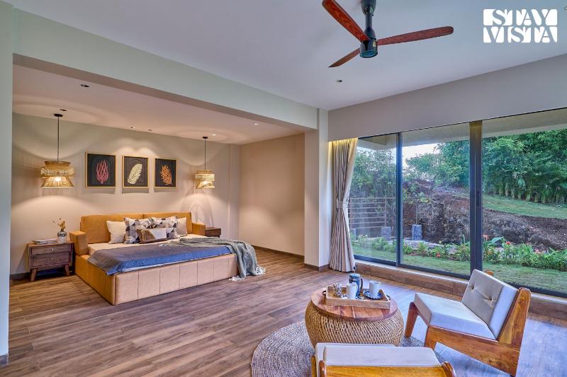 StayVista at La Rivieraa with Pool Lawn - image 7