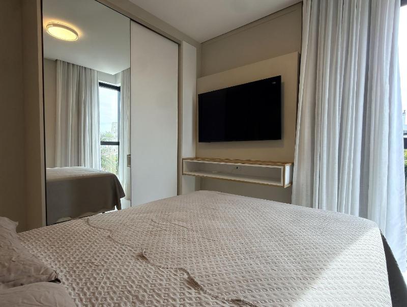Invictus Residence 202 - Apartamento amplo com ar-condicionado em todos os ambientes localizado próximo a comércios e a 250 metros da praia. - image 19