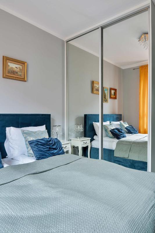 Spacious Apartment with a Balcony and Parking by Noclegi Renters - image 5