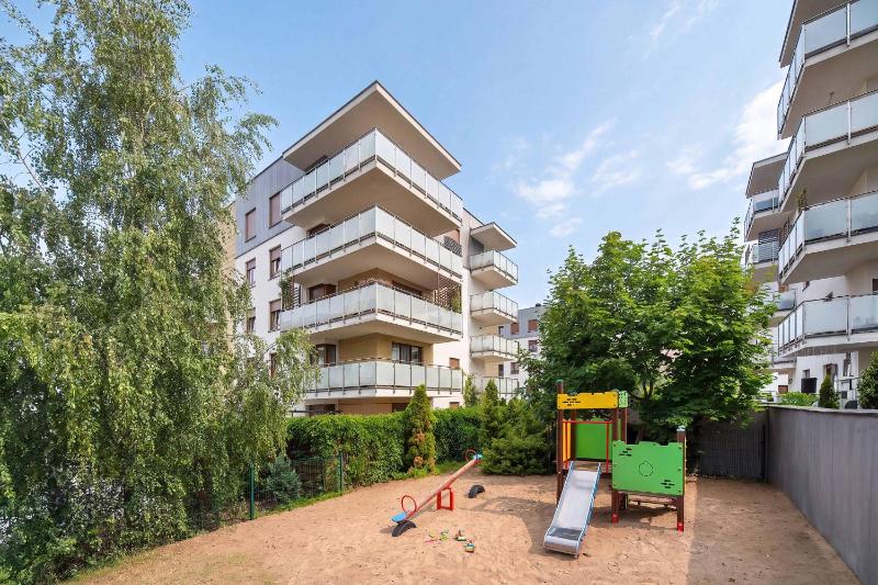 Spacious Apartment with a Balcony and Parking by Noclegi Renters - image 21