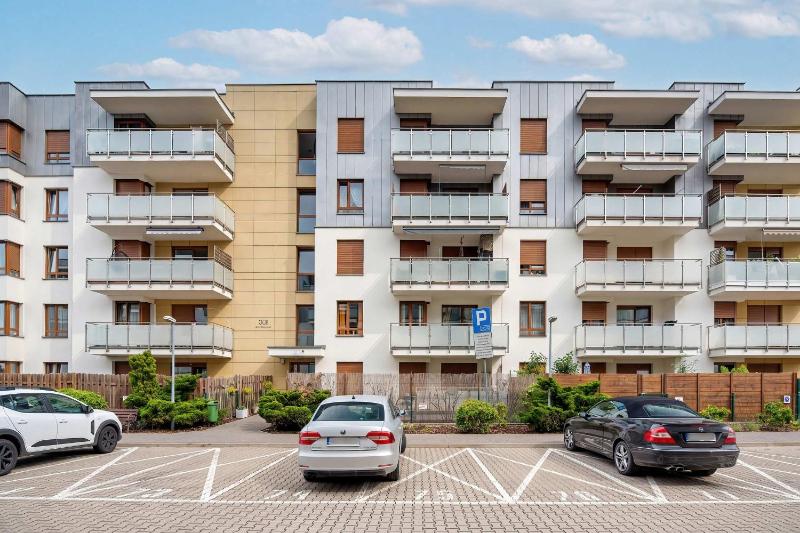 Spacious Apartment with a Balcony and Parking by Noclegi Renters - image 17