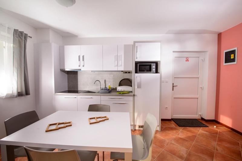 One-Bedroom Apartment with Balcony Ground floor image 3