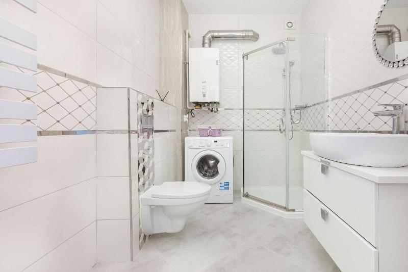 Komfortowy Apartament z Tarasem Blisko Plaży z Dodatkowymi Udogodnieniami w Pobierowie by Noclegi Renters - image 23