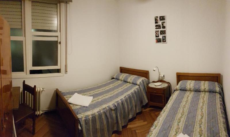 Interior Twin Room with Shared Bathroom image 1