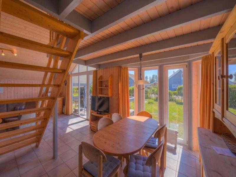 Ferienhaus im skandinavischen Stil mit Garten im Hafendorf Müritz - image 9