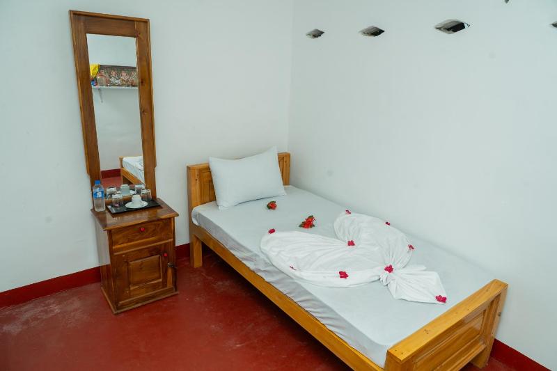 Nilaveli Beach Bungalow - image 33