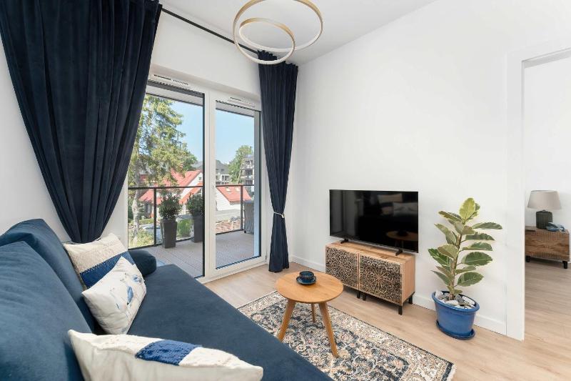 Stylowy Apartament z Klimatyzacją i Parkingiem Blisko Plaży by Noclegi Renters - image 23