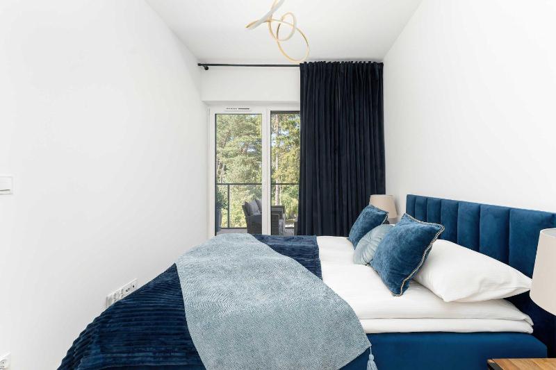 Stylowy Apartament z Klimatyzacją i Parkingiem Blisko Plaży by Noclegi Renters - image 17
