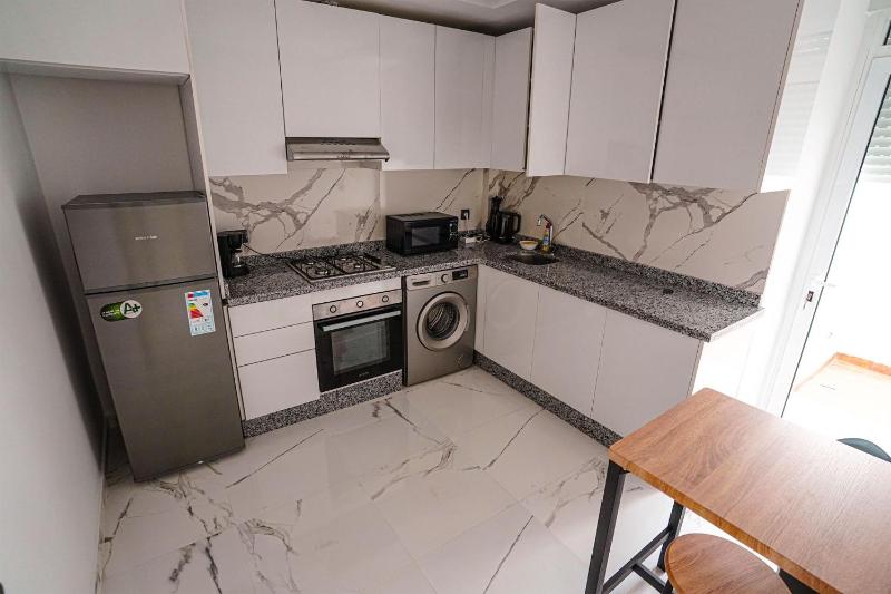 Charming 2-Bedroom Apartment in the Heart of Martil Morocco - image 28