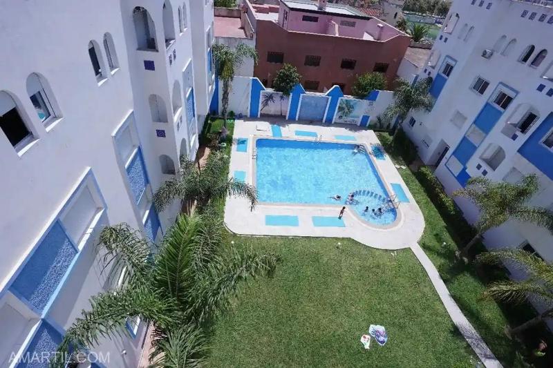 Charming 2-Bedroom Apartment with Garden View in Martil - image 4