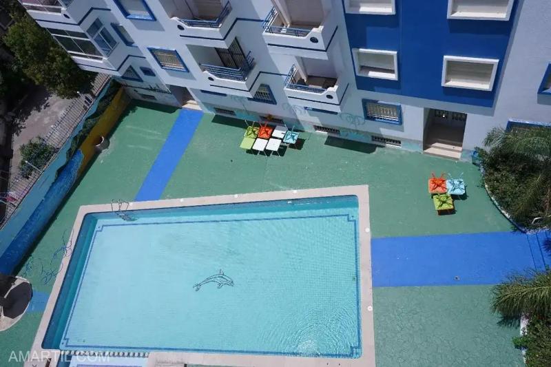 Charming 2-Bedroom Apartment with City View in Martil - image 7