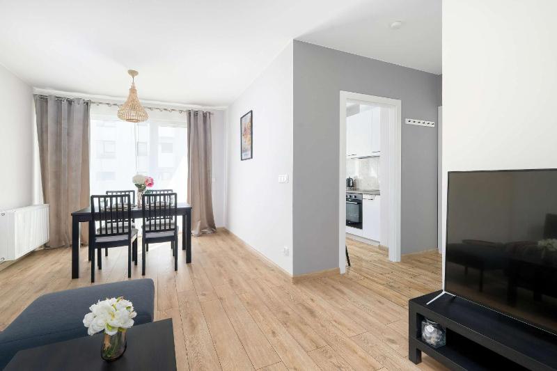 Unique Apartment with Balcony and Underground Parking by Noclegi Renters - image 20