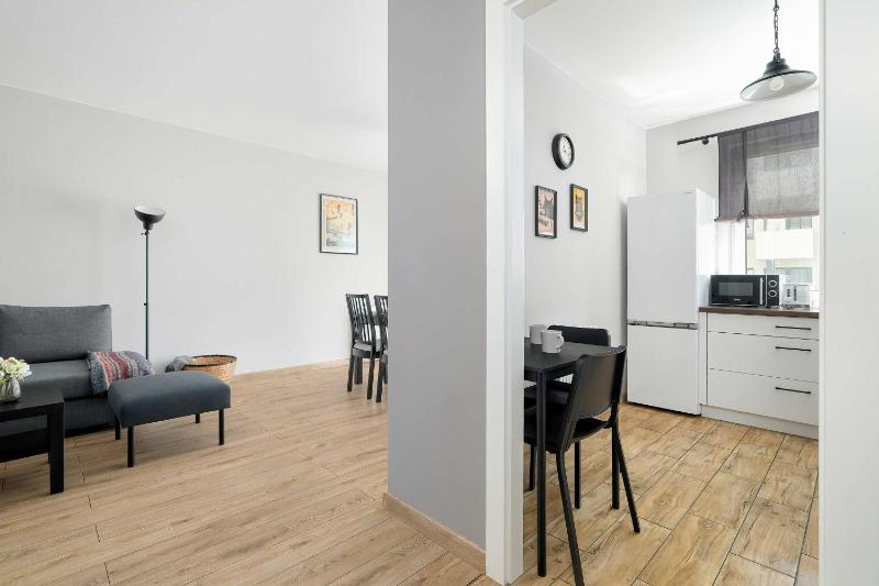 Unique Apartment with Balcony and Underground Parking by Noclegi Renters - image 5