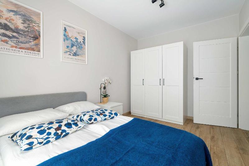 Unique Apartment with Balcony and Underground Parking by Noclegi Renters - image 15