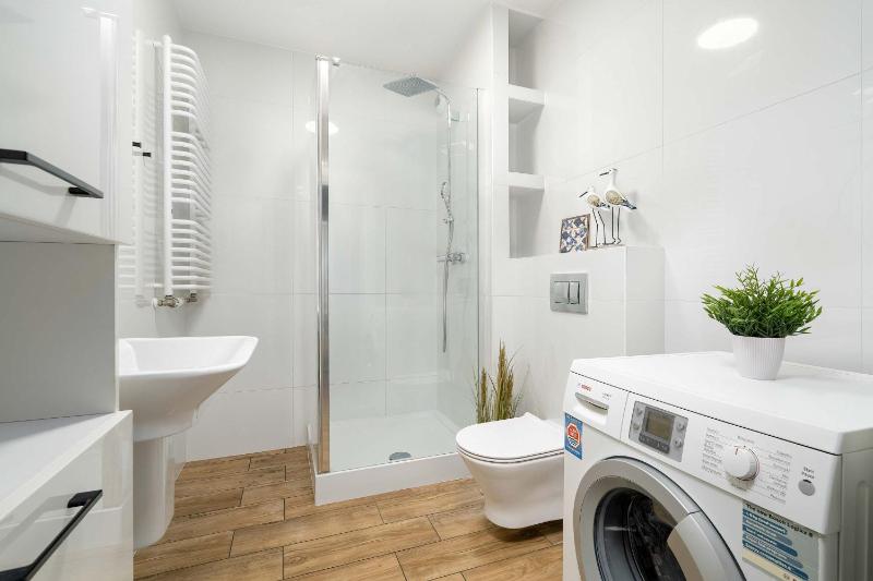 Unique Apartment with Balcony and Underground Parking by Noclegi Renters - image 11