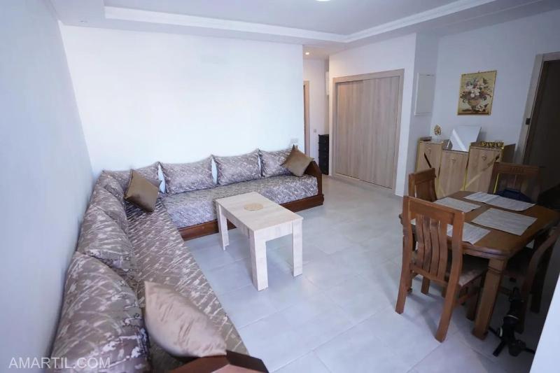 Charming 1-Bedroom Apartment in Martil with pool - image 11