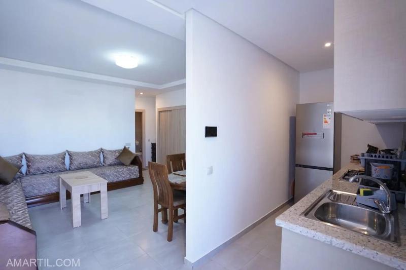 Charming 1-Bedroom Apartment in Martil with pool - image 10