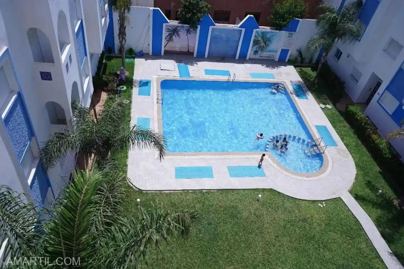 Charming 2-Bedroom Apartment with Garden View in Martil - image 1