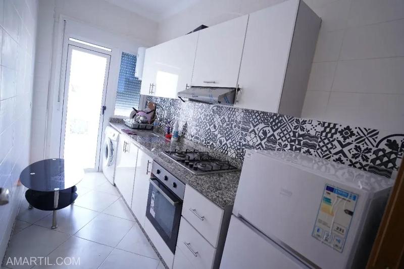 Charming 2-Bedroom Apartment with Garden View in Martil - image 19