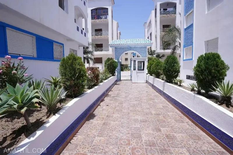 Charming 2-Bedroom Apartment with Garden View in Martil - image 11