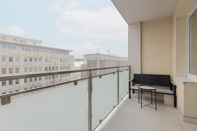 Sunny Apartment in the Center with Balcony & Air Conditioning by Noclegi Renters - image 8