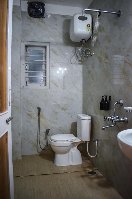 Karuna Court I Premium Room in a 3 BHK I Dedicated Toilet I Jalukbari - image 11