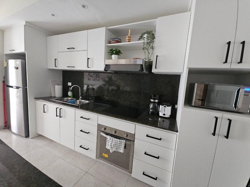 Eden Tropical new 1BR Condo Walk to Beach Pool - image 9