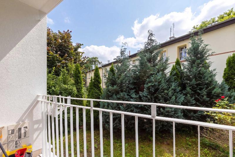 Cosy Apartment with a Balcony for 6 People in a Green Neighbourhood by Noclegi Renters - image 15
