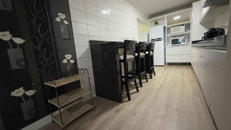 Beachfront Apartment in Meia Praia - image 2