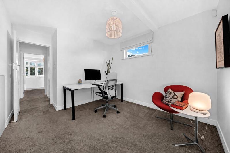 Sun-Filled Narrow Neck Retreat Spa Deck & Media - image 16