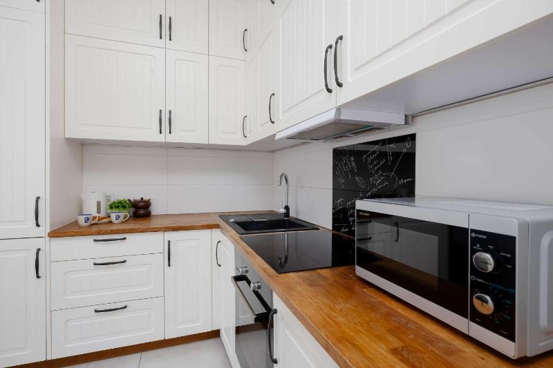 Spacious Apartment Near the Airport Parking & Remote Working by Noclegi Renters - image 14