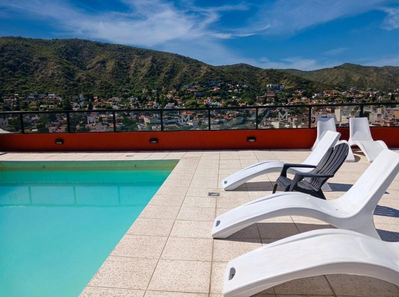 Dpto céntrico balcón con parrilla y piscina - image 13